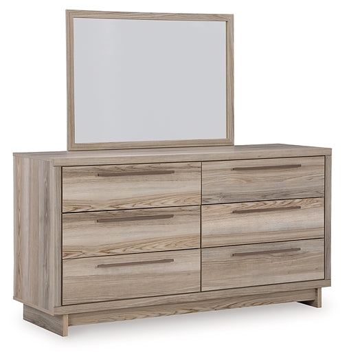 Hasbrick Queen Panel Bed with Mirrored Dresser and Chest