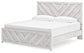 Cayboni King Panel Bed with Mirrored Dresser, Chest and Nightstand